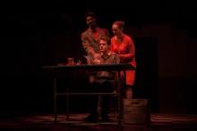 Lehigh University Theatre - The Pillowman, man sitting at desk