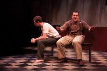 Lehigh University Theatre - The Pillowman, men sitting on bench turned away from each other