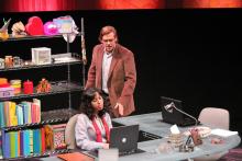 Lehigh University Theatre - Dusty and the Big Bad World, woman on laptop with man behind her
