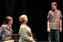 Lehigh University Theatre - Five Flights, man in striped shirt standing