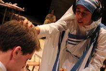 Lehigh University Theatre - The Last Days of Judas Iscariot, woman putting hand on top of man's head